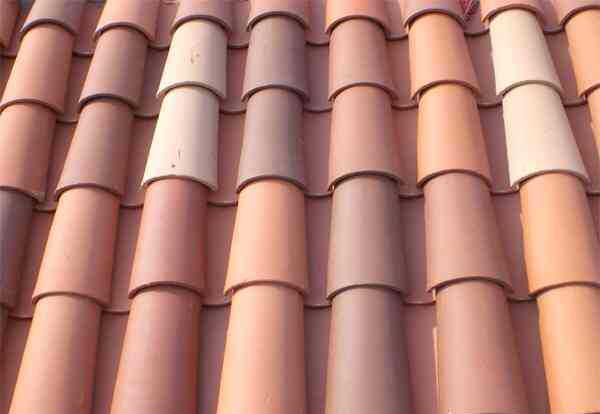 how do you mount solar panels of spanish tile roofs